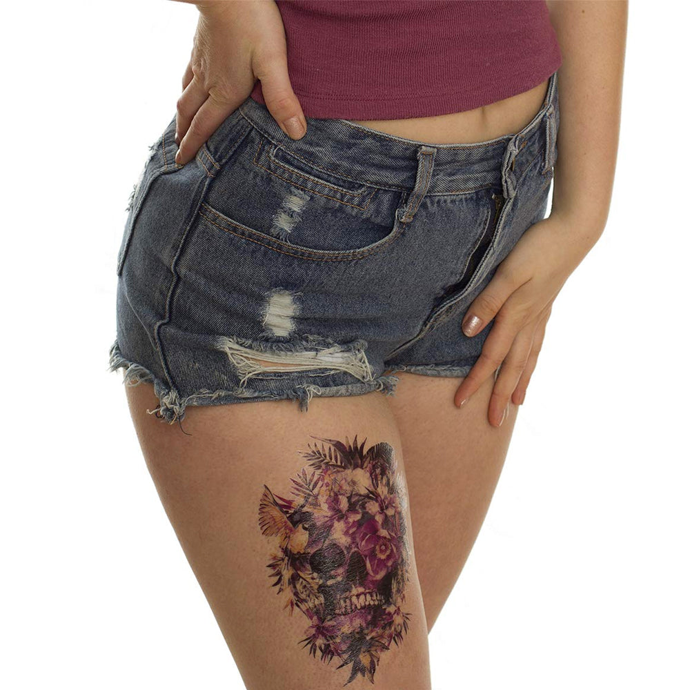 Calavera con flores rosadas - TETO - Tatuajes Temporales